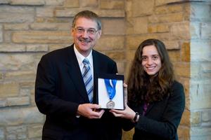 Dr. Leyal Soleymani access the Colton Medal from Dr. Ian McWalter
