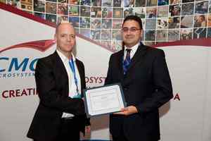 The MEMSCAP Microsystems Design Award is presented to Amine Miled by Busbee Hardy The MEMSCAP Microsystems Design Award is presented to Amine Miled by Busbee Hardy